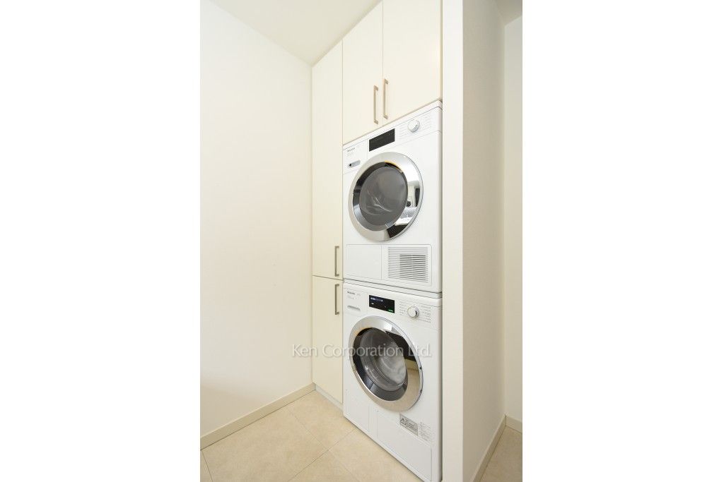 洗濯乾燥機 ※46階の同じ間取タイプを撮影。仕様が異なることがあります。