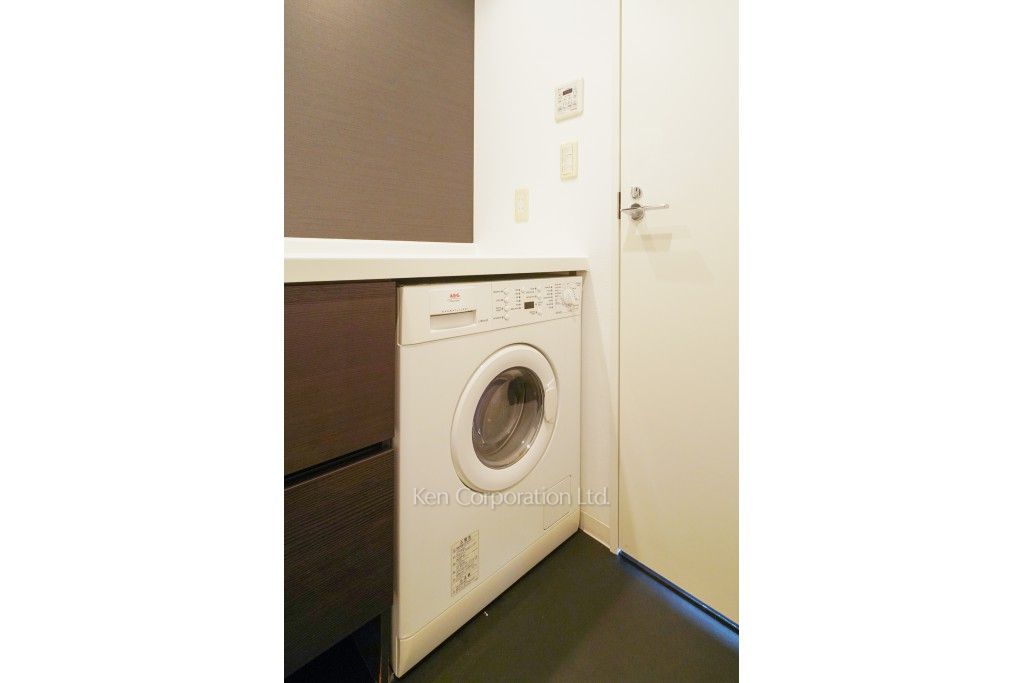 洗濯乾燥機 ※18階の同じ間取タイプを撮影。仕様が異なることがあります。