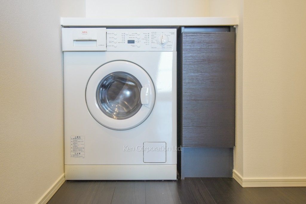 洗濯乾燥機 ※38階の同じ間取タイプを撮影。仕様が異なることがあります。