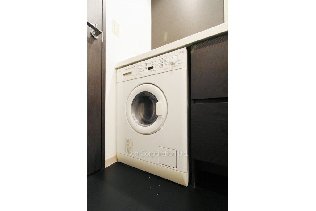 洗濯乾燥機 ※18階の同じ間取タイプを撮影。仕様が異なることがあります。