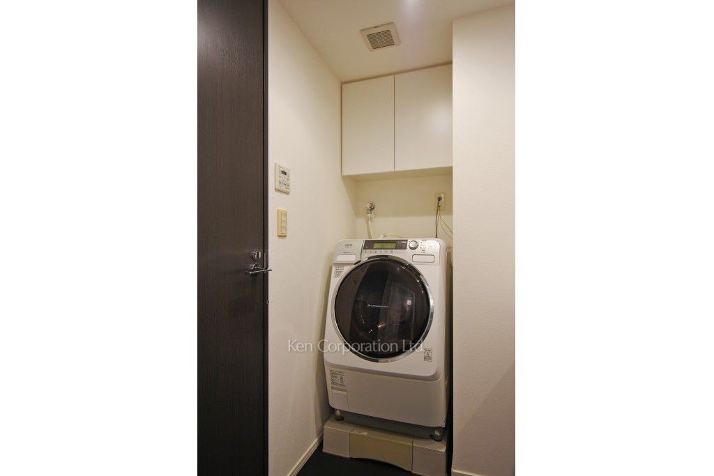 洗濯乾燥機 ※34階の同じ間取タイプを撮影。仕様が異なることがあります。